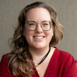 Portrait of a ceremony facilitator at the Happie Together Festival, holding grounded presence and calm energy in a natural festival setting.